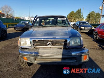 Piąte zdjęcie samochodu w środku: 1999 TOYOTA TACOMA V6 VIN:4TAWN72N0XZ512324 - miniatura