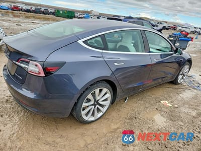 Trzecie zdjęcie samochodu z tyłu: 2018 TESLA MODEL 3 VIN:5YJ3E1EB2JF188263 - miniatura