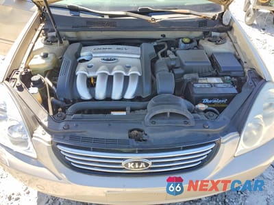 Zdjęcie 11 z 12 samochodu: 2006 KIA OPTIMA LX VIN:KNAGE123465067190 - miniatura