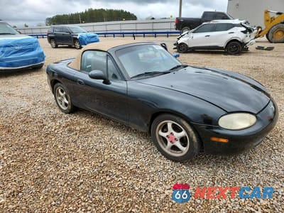 Czwarte zdjęcie samochodu z boku: 1999 MAZDA MX-5 MIATA VIN:JM1NB3534X0119653 - miniatura