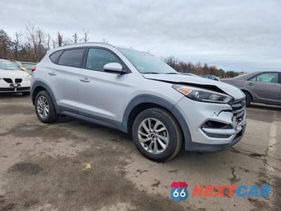 Czwarte zdjęcie samochodu z boku: 2016 HYUNDAI TUCSON SE VIN:KM8J3CA48GU134266 - miniatura