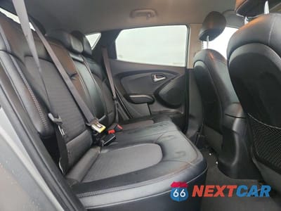 Zdjęcie 10 z 12 samochodu: 2013 HYUNDAI TUCSON GLS VIN:KM8JUCAC0DU573736 - miniatura
