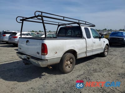 Trzecie zdjęcie samochodu z tyłu: 2000 FORD F150 VIN:1FTRX17L2YKA20341 - miniatura