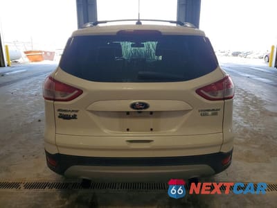 Zdjęcie 6 z 12 samochodu: 2013 FORD ESCAPE TITANIUM VIN:1FMCU0J93DUA46902 - miniatura