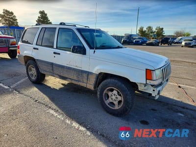 Czwarte zdjęcie samochodu z boku: 1997 JEEP GRAND CHEROKEE LAREDO VIN:1J4GZ58Y8VC533287 - miniatura