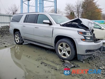 Czwarte zdjęcie samochodu z boku: 2015 CHEVROLET SUBURBAN K1500 LT VIN:1GNSKJKC8FR643210 - miniatura