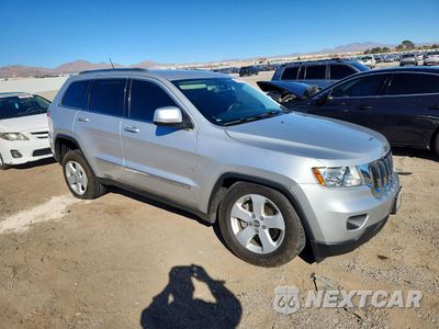 Czwarte zdjęcie samochodu z boku: 2013 JEEP GRAND CHEROKEE LAREDO VIN:1C4RJEAGXDC620971 - miniatura