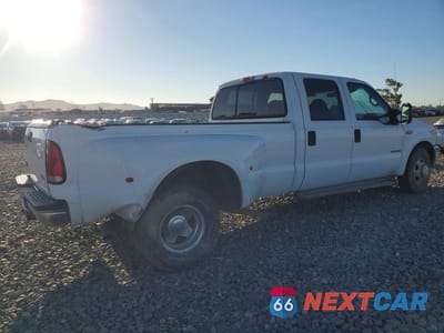 Trzecie zdjęcie samochodu z tyłu: 2001 FORD F350 SUPER DUTY VIN:1FTWW32F21EC31496 - miniatura