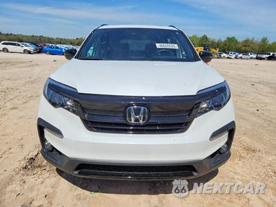 Piąte zdjęcie samochodu w środku: 2022 HONDA PILOT TRAILSPORT VIN:5FNYF6H80NB057001 - miniatura