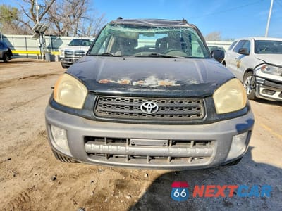 Piąte zdjęcie samochodu w środku: 2003 TOYOTA RAV4 BASE VIN:JTEGH20V430082278 - miniatura