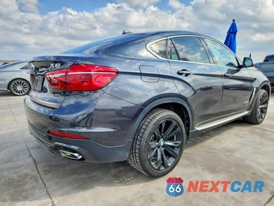 Trzecie zdjęcie samochodu z tyłu: 2019 BMW X6 SDRIVE35I VIN:5UXKU0C55K0H98858 - miniatura