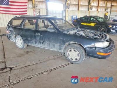 Czwarte zdjęcie samochodu z boku: 1994 TOYOTA CAMRY LE V6 VIN:4T1GK12W0RU027815 - miniatura