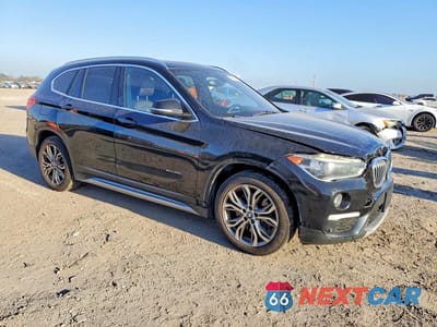 Czwarte zdjęcie samochodu z boku: 2016 BMW X1 XDRIVE28I VIN:WBXHT3Z33G4A51509 - miniatura