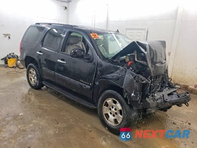 Czwarte zdjęcie samochodu z boku: 2007 CHEV TAHOE K1500 VIN:1GNFK13047R305925 - miniatura