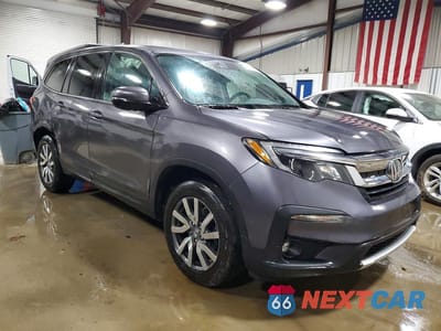 Czwarte zdjęcie samochodu z boku: 2021 HONDA PILOT EXL VIN:5FNYF6H57MB090761 - miniatura