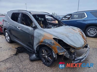 Czwarte zdjęcie samochodu z boku: 2018 HYUNDAI SANTA FE SPORT 2.4L VIN:5NMZUDLB2JH062274 - miniatura