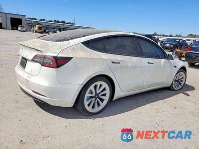 Trzecie zdjęcie samochodu z tyłu: 2021 TESLA MODEL 3 VIN:5YJ3E1EA4MF032219 - miniatura