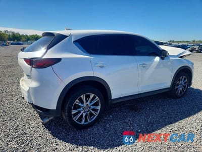 Trzecie zdjęcie samochodu z tyłu: 2021 MAZDA CX-5 GRAND TOURING VIN:JM3KFADMXM0349707 - miniatura