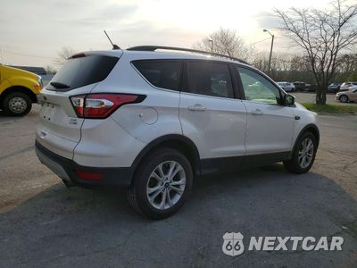 Trzecie zdjęcie samochodu z tyłu: 2018 FORD ESCAPE SEL VIN:1FMCU9HD4JUA51861 - miniatura