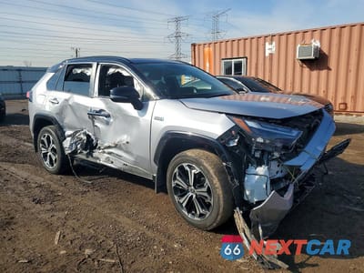 Czwarte zdjęcie samochodu z boku: 2023 TOYOTA RAV4 PRIME XSE VIN:JTMEB3FV9PD144413 - miniatura