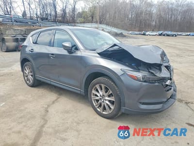 Czwarte zdjęcie samochodu z boku: 2019 MAZDA CX-5 GRAND TOURING VIN:JM3KFBDMXK0533063 - miniatura