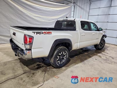 Trzecie zdjęcie samochodu z tyłu: 2022 TOYOTA TACOMA TRD OFF-ROAD VIN:3TYDZ5BN3NT014903 - miniatura