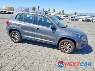 Czwarte zdjęcie samochodu z boku: 2015 VOLKSWAGEN TIGUAN S VIN:WVGAV7AX9FW613035 - miniatura
