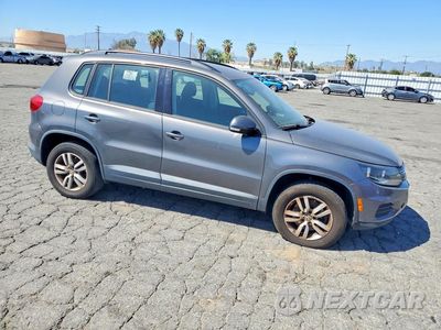Czwarte zdjęcie samochodu z boku: 2015 VOLKSWAGEN TIGUAN S VIN:WVGAV7AX9FW613035 - miniatura