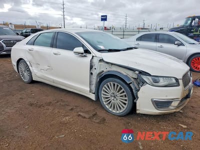 Czwarte zdjęcie samochodu z boku: 2017 LINCOLN MKZ HYBRID RESERVE VIN:3LN6L5MU8HR624227 - miniatura