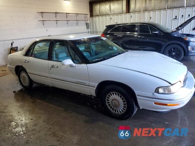 Czwarte zdjęcie samochodu z boku: 1999 BUICK LESABRE LIMITED VIN:1G4HR52K2XH412447 - miniatura
