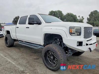 Czwarte zdjęcie samochodu z boku: 2015 GMC SIERRA K3500 DENALI VIN:1GT424E82FF646695 - miniatura