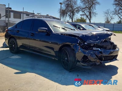 Czwarte zdjęcie samochodu z boku: 2023 BMW 330XI VIN:3MW89FF0XP8D12441 - miniatura