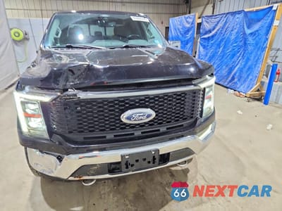 Piąte zdjęcie samochodu w środku: 2021 FORD F150 SUPERCREW VIN:1FTFW1E89MFB05782 - miniatura