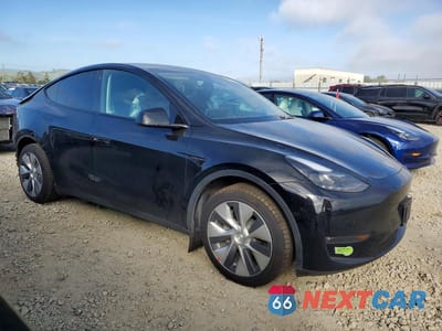Czwarte zdjęcie samochodu z boku: 2023 TESLA MODEL Y VIN:7SAYGDEE8PF707419 - miniatura
