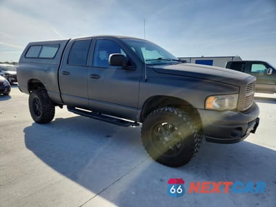 Czwarte zdjęcie samochodu z boku: 2002 DODGE RAM 1500 VIN:1D7HU18Z82J259399 - miniatura