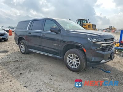 Czwarte zdjęcie samochodu z boku: 2021 CHEVROLET SUBURBAN C1500 LT VIN:1GNSCCKD7MR239216 - miniatura