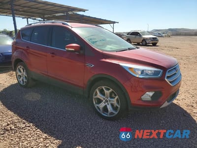 Czwarte zdjęcie samochodu z boku: 2018 FORD ESCAPE TITANIUM VIN:1FMCU0J90JUD22173 - miniatura