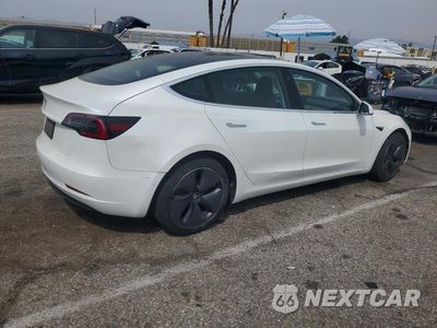 Trzecie zdjęcie samochodu z tyłu: 2020 TESLA MODEL 3 VIN:5YJ3E1EA2LF745165 - miniatura