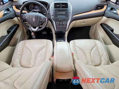 Zdjęcie 8 z 14 samochodu: 2015 LINCOLN MKC VIN:5LMTJ2AH1FUJ15968 - miniatura