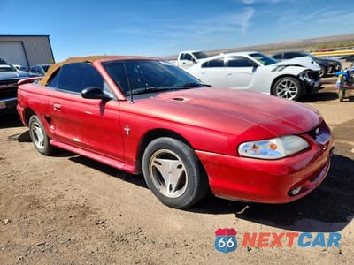 Czwarte zdjęcie samochodu z boku: 1997 FORD MUSTANG VIN:1FALP444XVF201105 - miniatura