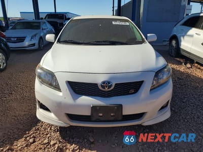 Piąte zdjęcie samochodu w środku: 2010 TOYOTA COROLLA S VIN:2T1BU4EE7AC453693 - miniatura