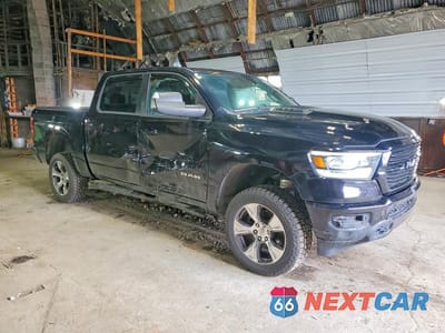 Czwarte zdjęcie samochodu z boku: 2023 RAM 1500 LARAMIE VIN:1C6SRFJTXPN623866 - miniatura