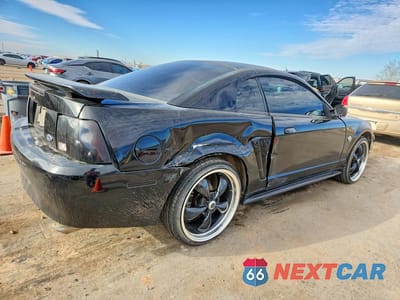 Trzecie zdjęcie samochodu z tyłu: 2004 FORD MUSTANG VIN:1FAFP40624F165607 - miniatura