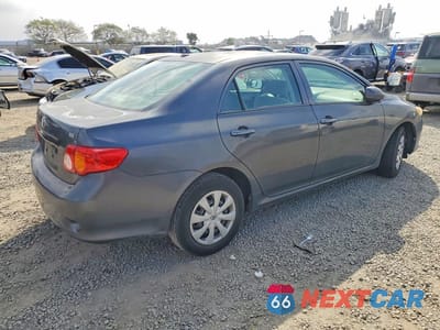 Trzecie zdjęcie samochodu z tyłu: 2010 TOYOTA COROLLA BASE VIN:1NXBU4EE0AZ190851 - miniatura