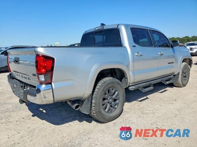 Trzecie zdjęcie samochodu z tyłu: 2023 TOYOTA TACOMA SR5 V6 VIN:3TYAZ5CN5PT035692 - miniatura