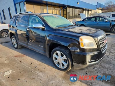Czwarte zdjęcie samochodu z boku: 2017 GMC TERRAIN SLT VIN:2GKFLPE31H6341024 - miniatura