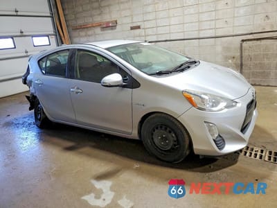 Czwarte zdjęcie samochodu z boku: 2016 TOYOTA PRIUS C TWO VIN:JTDKDTB3XG1118454 - miniatura
