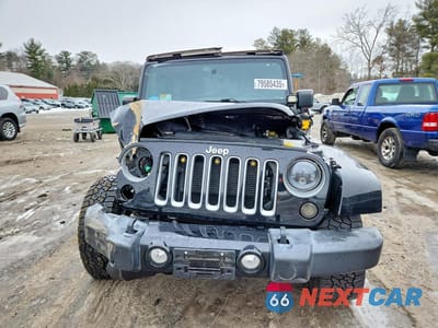 Piąte zdjęcie samochodu w środku: 2016 JEEP WRANGLER UNLIMITED SAHARA VIN:1C4BJWEG9GL347155 - miniatura