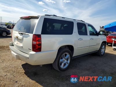 Trzecie zdjęcie samochodu z tyłu: 2011 CHEVROLET SUBURBAN C1500 LTZ VIN:1GNSCKE04BR125612 - miniatura