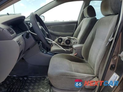 Zdjęcie 7 z 11 samochodu: 2003 TOYOTA COROLLA CE VIN:1NXBR32E83Z097613 - miniatura